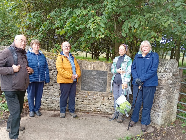 Group Photo by Plaque
